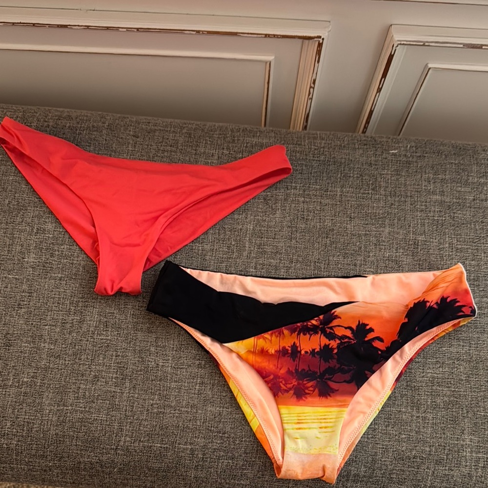 Victoria's Secret Sunset Palm Bikini Bottom and Roxy orange swim bottom.